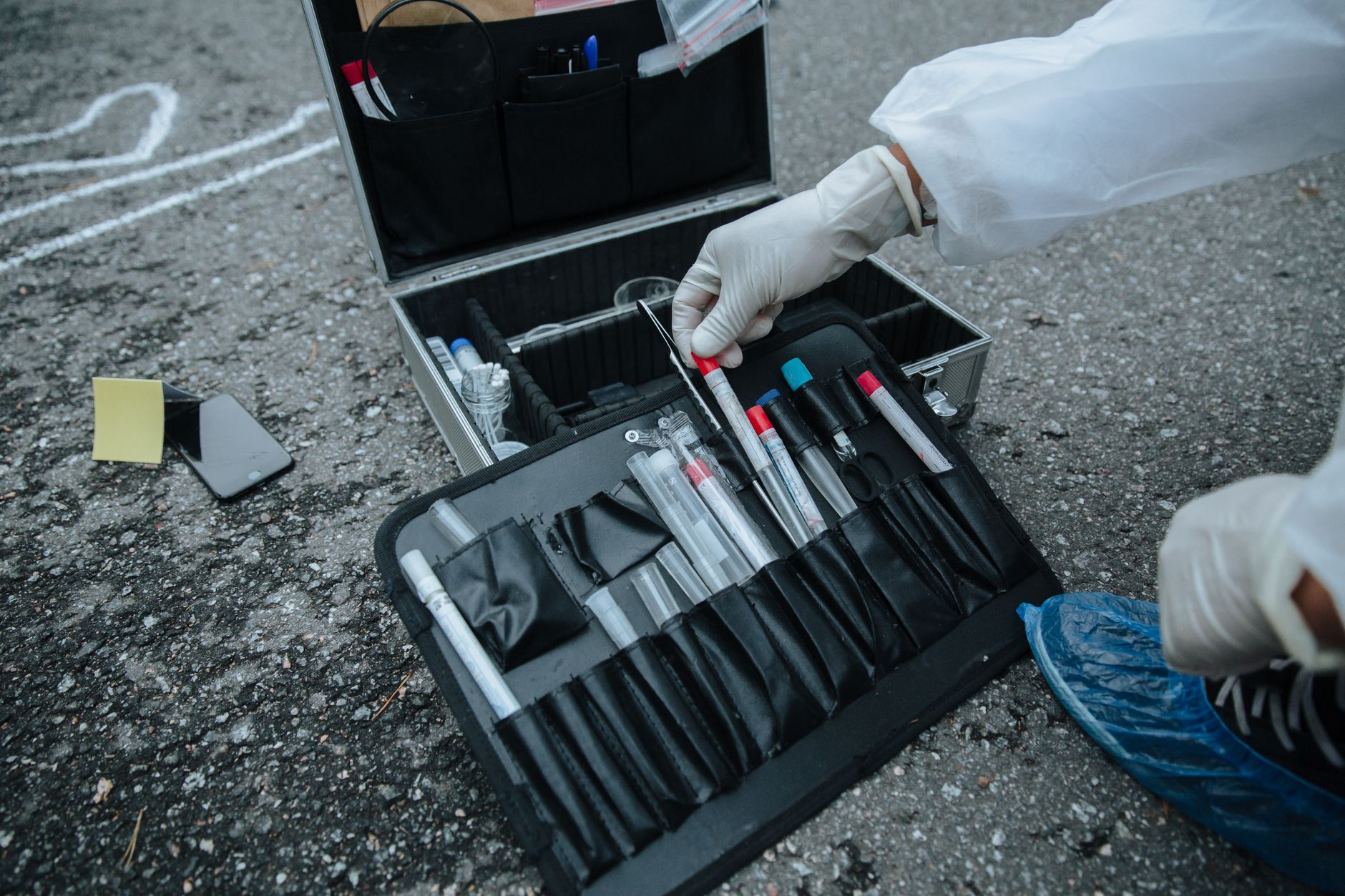 Close-up of precision drafting and inspection instruments illustrating the technical detail behind Pack Engineering's published structural engineering textbook.